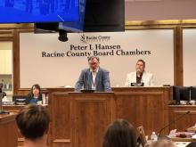 Racine County Executive Ralph Malicki is at the podium at Tuesday night's county board meeting. 