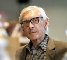 Gov. Tony Evers takes questions from eighth-graders Monday, May 11, 2026, in Barneveld, Wis. Angela Major/WPR