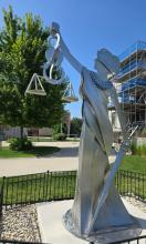 The sculpture as it stands in front of the Volney French House on Library Square. 