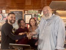 L-r, new Frank's owners Pablo and Diana Escribano and soon-to-be former owners Julie Rittmiller and Kevin Ervin. 
